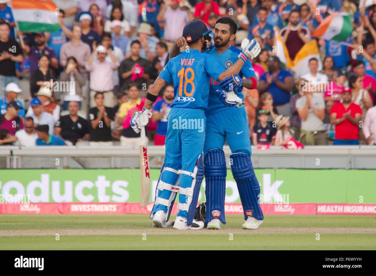 Manchester, England, 3 July 2018. Virat Kohli congratulating Lokesh Rahul on reaching his century against England in the first Vitality T20 International at Emirates Old Trafford. Credit: Colin Edwards/Alamy Live News. Stock Photo