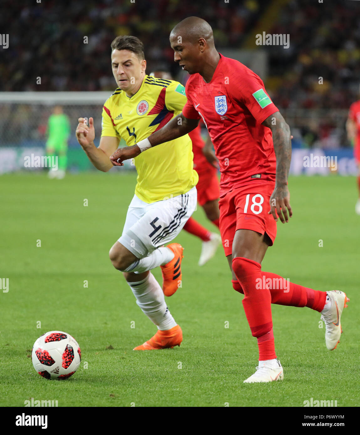 Moscow, Russia. 3rd July, 2018. Ashley Young (R) of England vies with Santiago Arias of Colombia during the 2018 FIFA World Cup round of 16 match between England and Colombia in Moscow, Russia, July 3, 2018. Credit: Bai Xueqi/Xinhua/Alamy Live News Stock Photo
