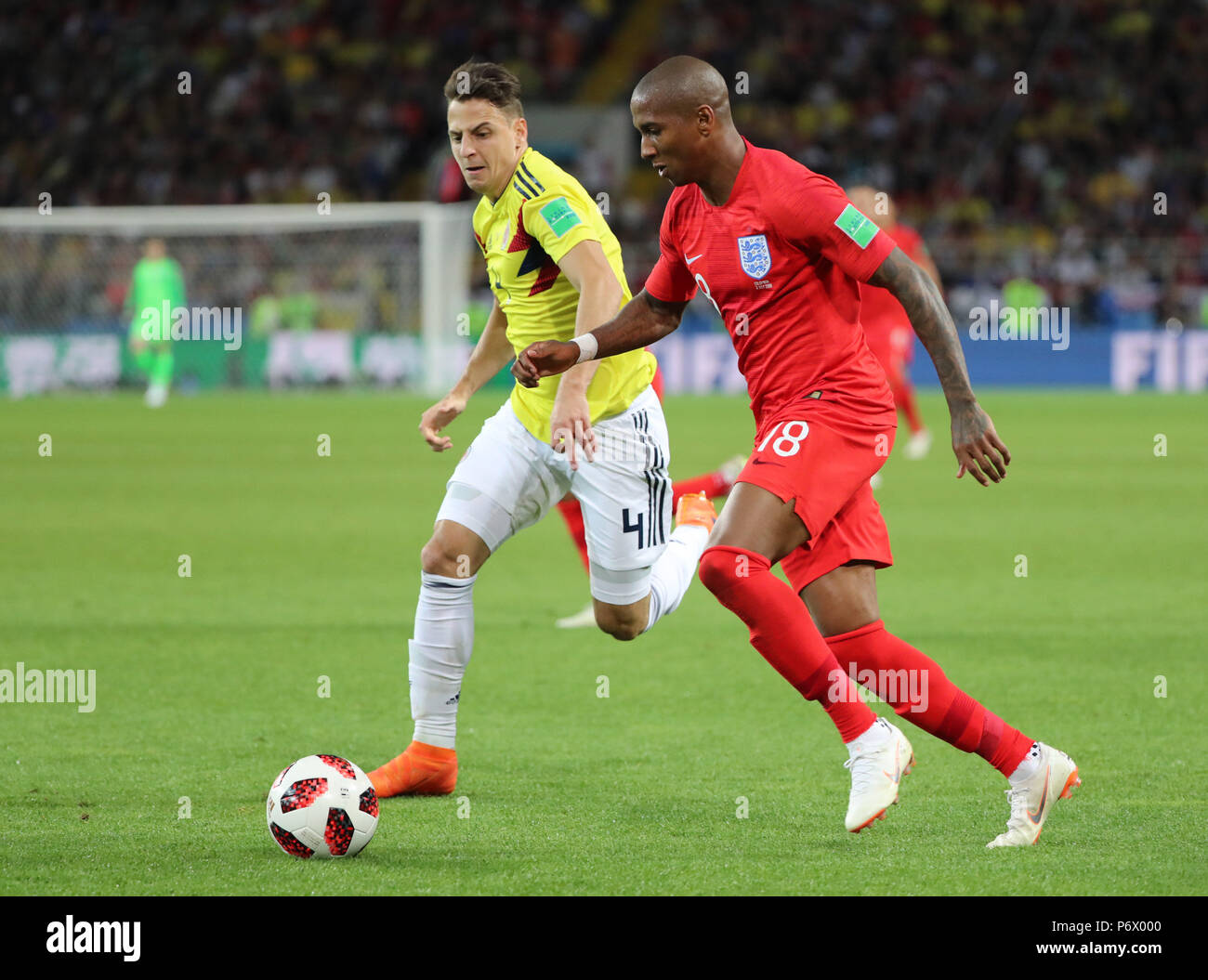 Moscow, Russia. 3rd July, 2018. Ashley Young (R) of England vies with Santiago Arias of Colombia during the 2018 FIFA World Cup round of 16 match between England and Colombia in Moscow, Russia, July 3, 2018. Credit: Bai Xueqi/Xinhua/Alamy Live News Stock Photo