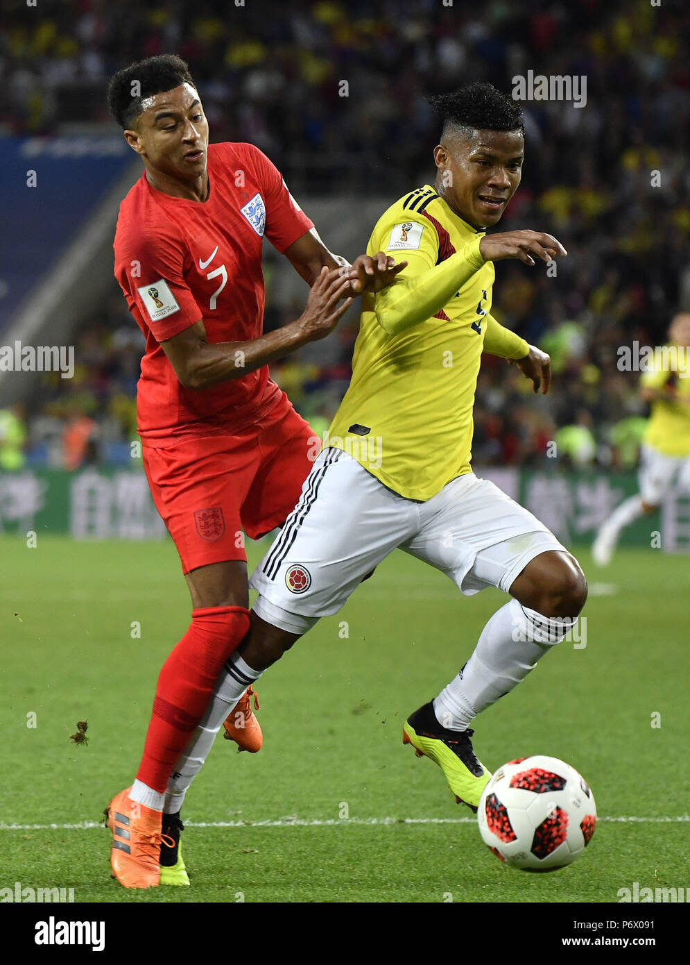 Moscow, Russia. 3rd July, 2018. Jesse Lingard (L) of England vies with Wilmar Barrios of Colombia during the 2018 FIFA World Cup round of 16 match between England and Colombia in Moscow, Russia, July 3, 2018. Credit: He Canling/Xinhua/Alamy Live News Stock Photo