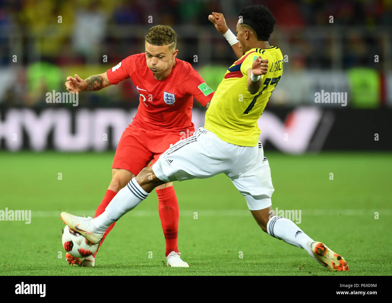 Moscow, Russia. 3rd July, 2018. Kieran Trippier (L) of England vies with Johan Mojica of Colombia during the 2018 FIFA World Cup round of 16 match between England and Colombia in Moscow, Russia, July 3, 2018. Credit: Du Yu/Xinhua/Alamy Live News Stock Photo