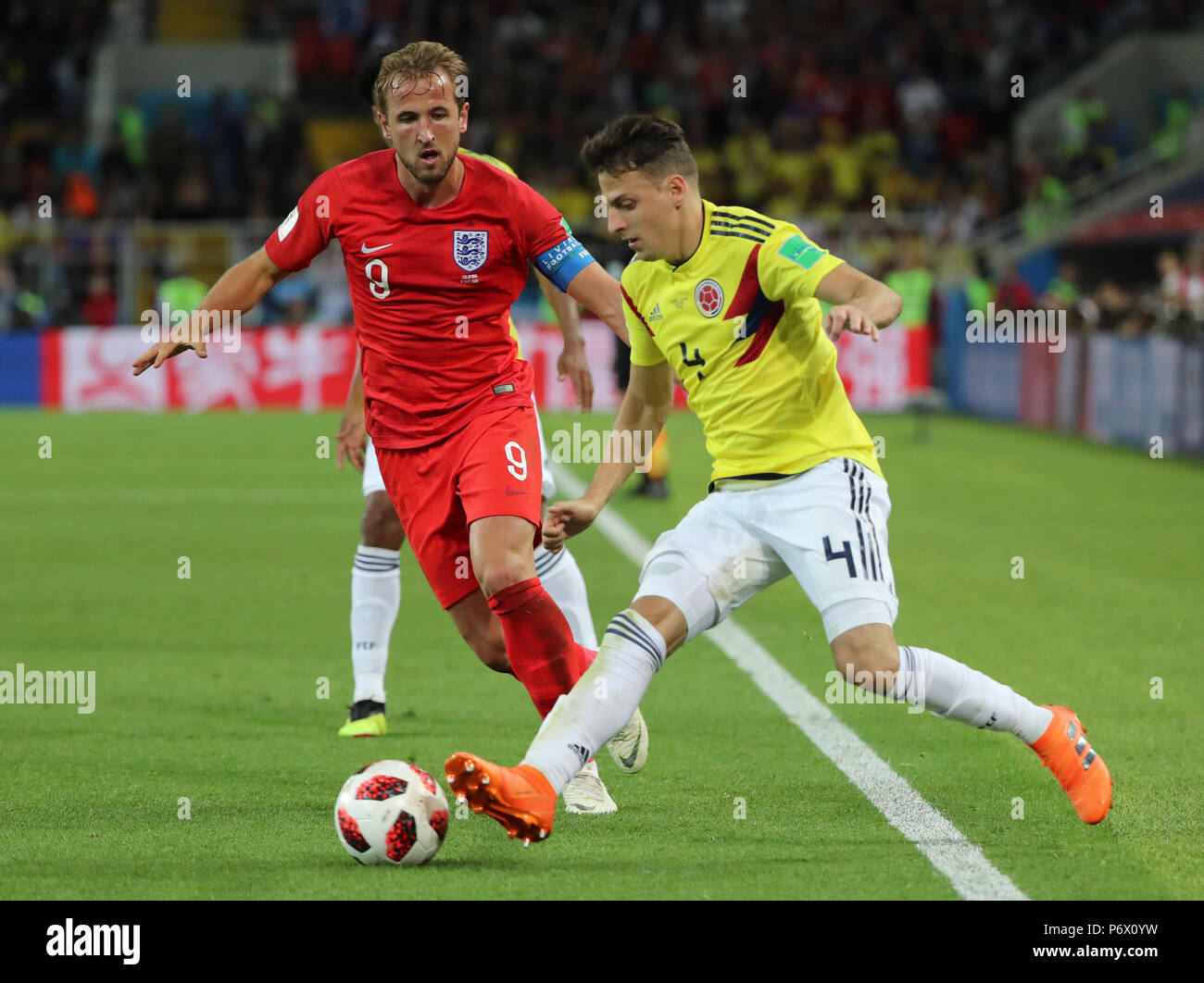 Moscow, Russia. 3rd July, 2018. Harry Kane (L) of England vies with Santiago Arias of Colombia during the 2018 FIFA World Cup round of 16 match between England and Colombia in Moscow, Russia, July 3, 2018. Credit: Bai Xueqi/Xinhua/Alamy Live News Stock Photo