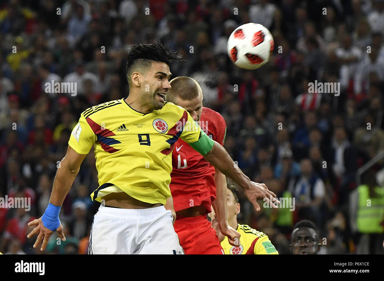 Moscow, Russia. 3rd July, 2018. Eric Dier (R) of England vies with Radamel Falcao of Colombia during the 2018 FIFA World Cup round of 16 match between England and Colombia in Moscow, Russia, July 3, 2018. England won 5-4 (4-3 in penalty shootout) and advanced to the quarter-final. Credit: He Canling/Xinhua/Alamy Live News Stock Photo