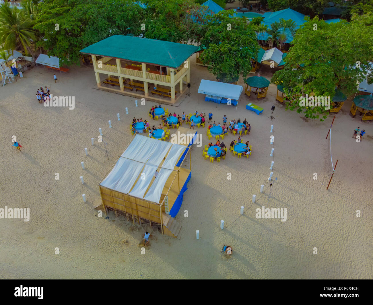 Aerial view of the visitors while waiting for the start of the summer company outing event held at the beach of Laiya, San Juan, Batangas Stock Photo