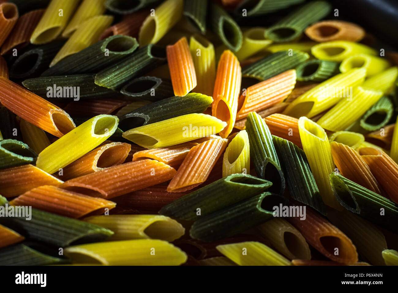 Macaroni tricolor with organic pasta integral Stock Photo - Alamy
