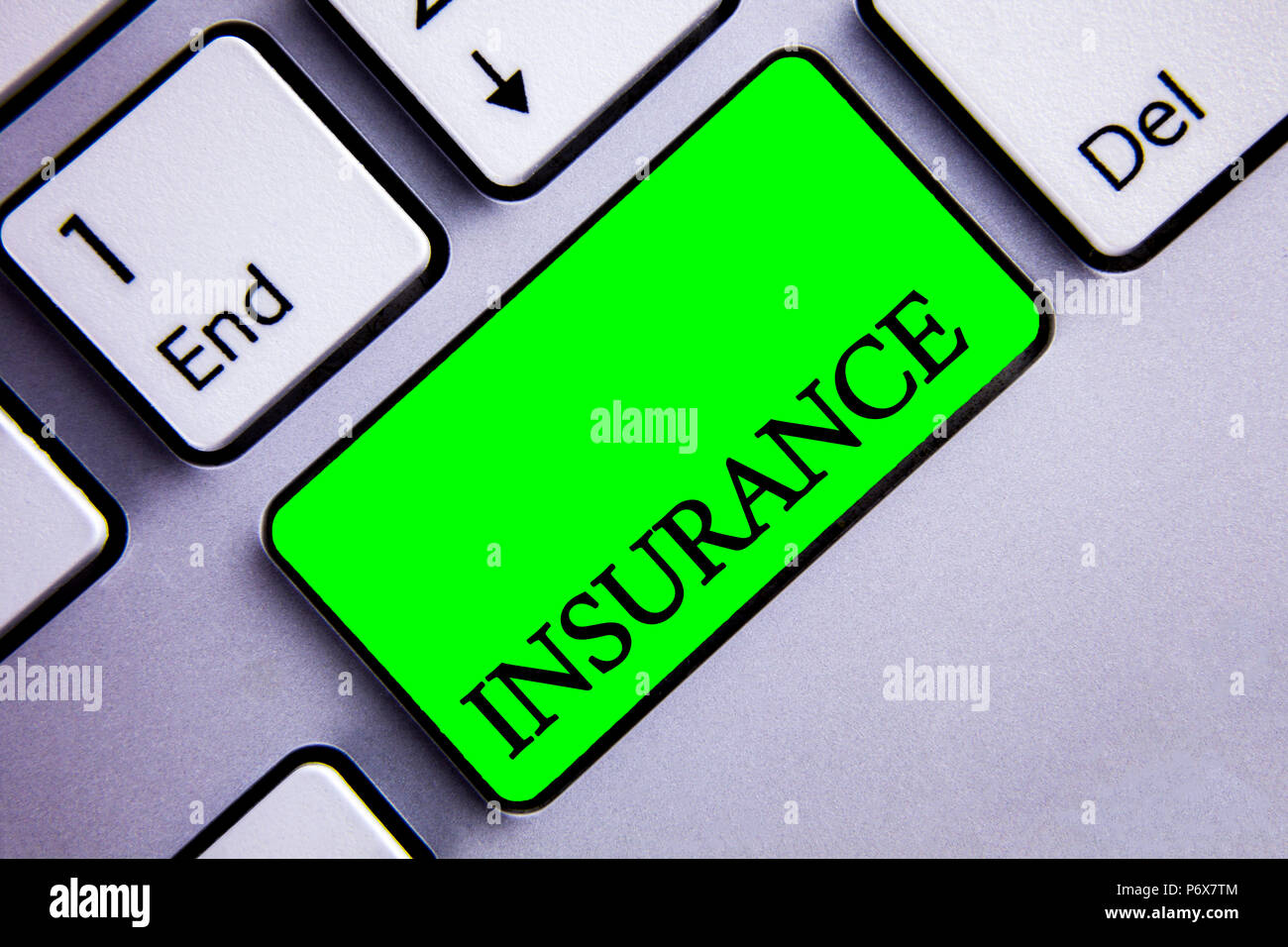 Handwriting text writing Insurance. Concept meaning Policy for financial protection or reimbursement against losses Keyboard green key Intention creat Stock Photo