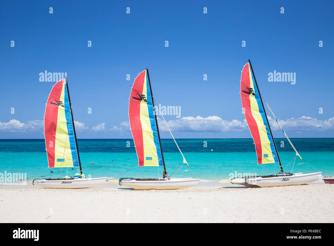 Cuba, Holguin Province, Catamarans on Playa Esmeralda Stock Photo