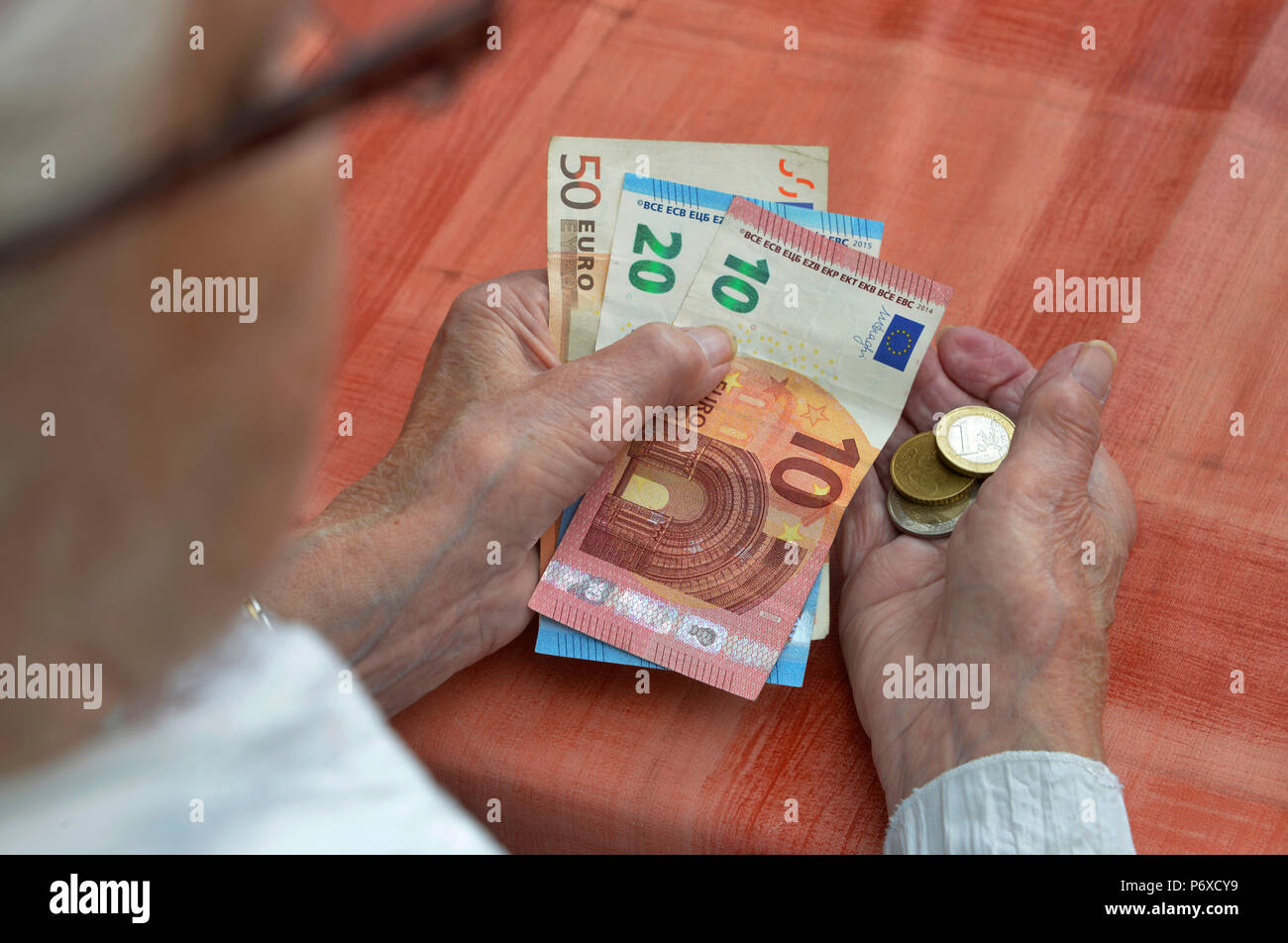 Money in hands Stock Photo