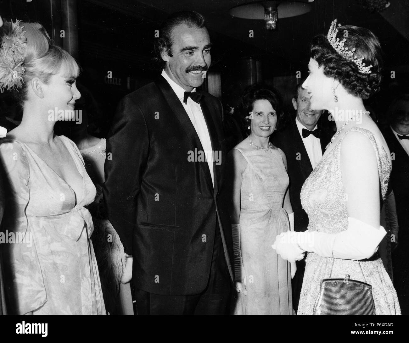 queen elizabeth II, diane cilento, sean connery, lewis gilbert, hylda tafler, odeon theatre, london 1967 Stock Photo