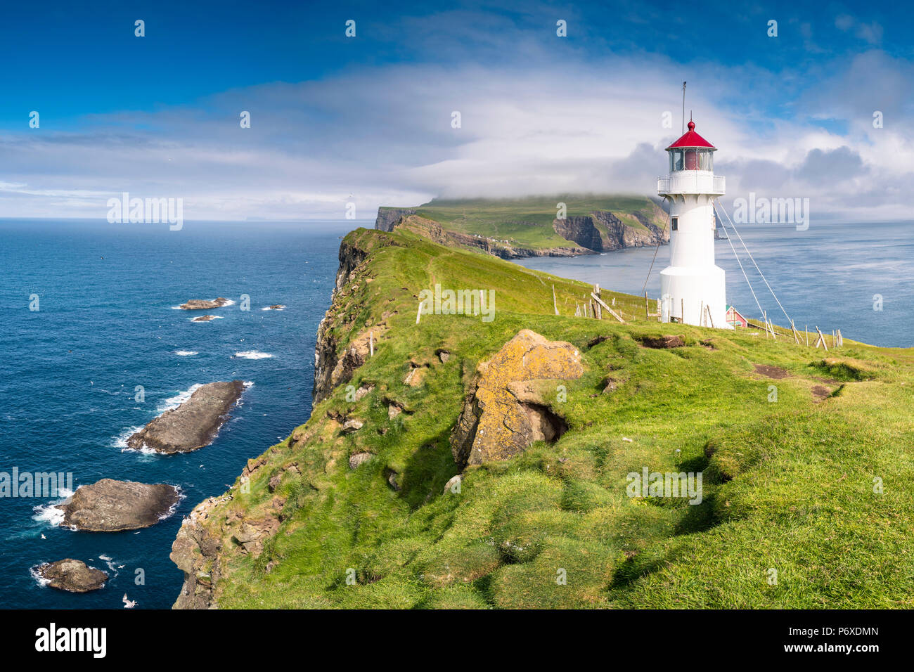 Mykines island, Faroe Islands, Denmark. Lighthouse and cliffs. Stock Photo