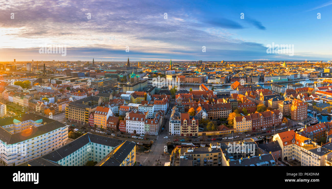 Copenhagen, Hovedstaden, Denmark, Northern Europe. High angle view over the old town from the Our Savior church at sunset. Stock Photo
