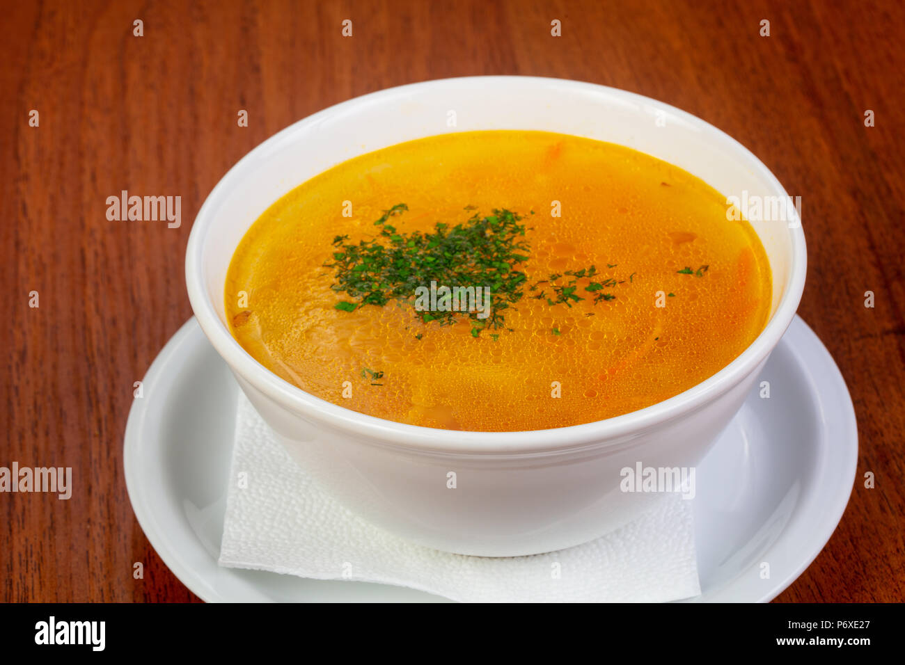 Delicious chicken bouillon with noodles and herbs Stock Photo Alamy