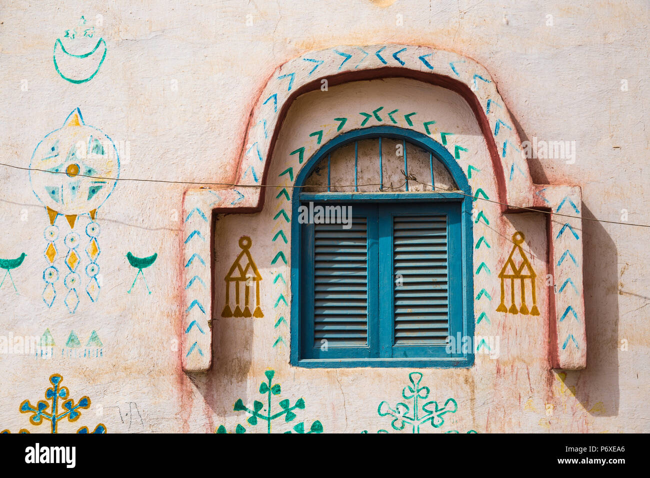 Egypt, Upper Egypt, Aswan, Blue window shutters on house in Nubian village on Elephantine Island Stock Photo