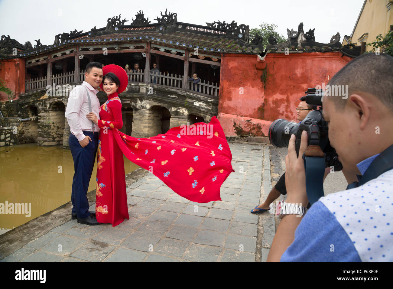 Photo session in front of the Japanese covered bridge, Hoi An , Vietnam Stock Photo