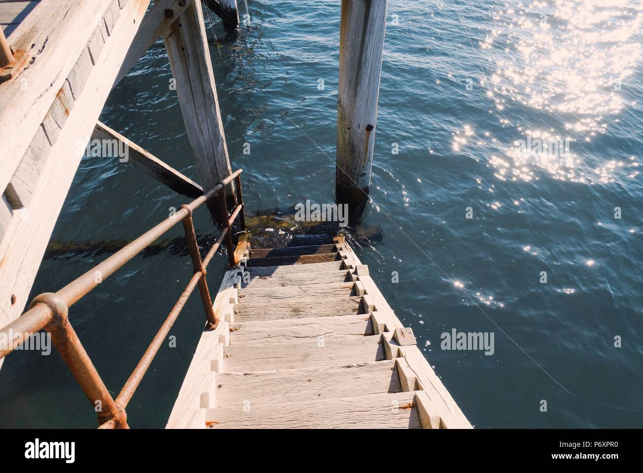 Jetty stairs into the water at Port Noarlunga in South Australia Stock Photo