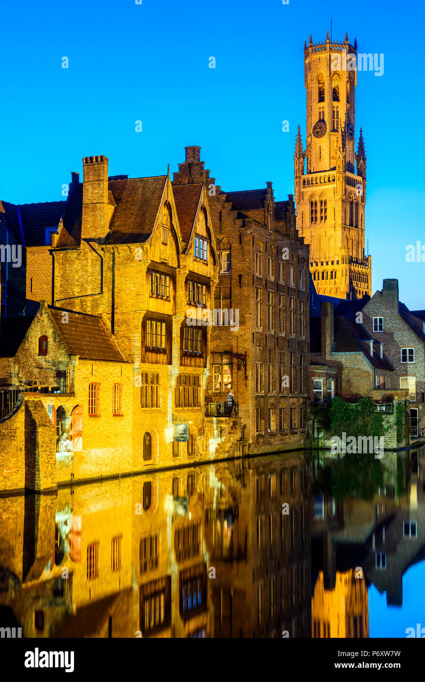 Dijver canal with Belfort medieval tower in the background, Bruges, West Flanders, Belgium Stock Photo