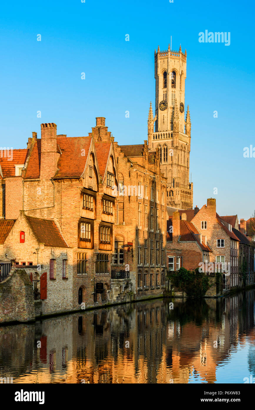 Dijver canal with Belfort medieval tower in the background, Bruges, West Flanders, Belgium Stock Photo