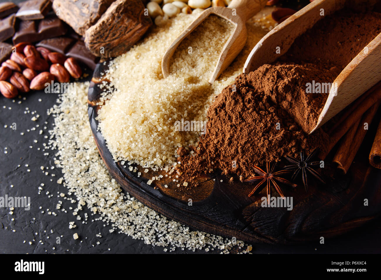 Cocoa powder, chocolate, nuts and spices Stock Photo