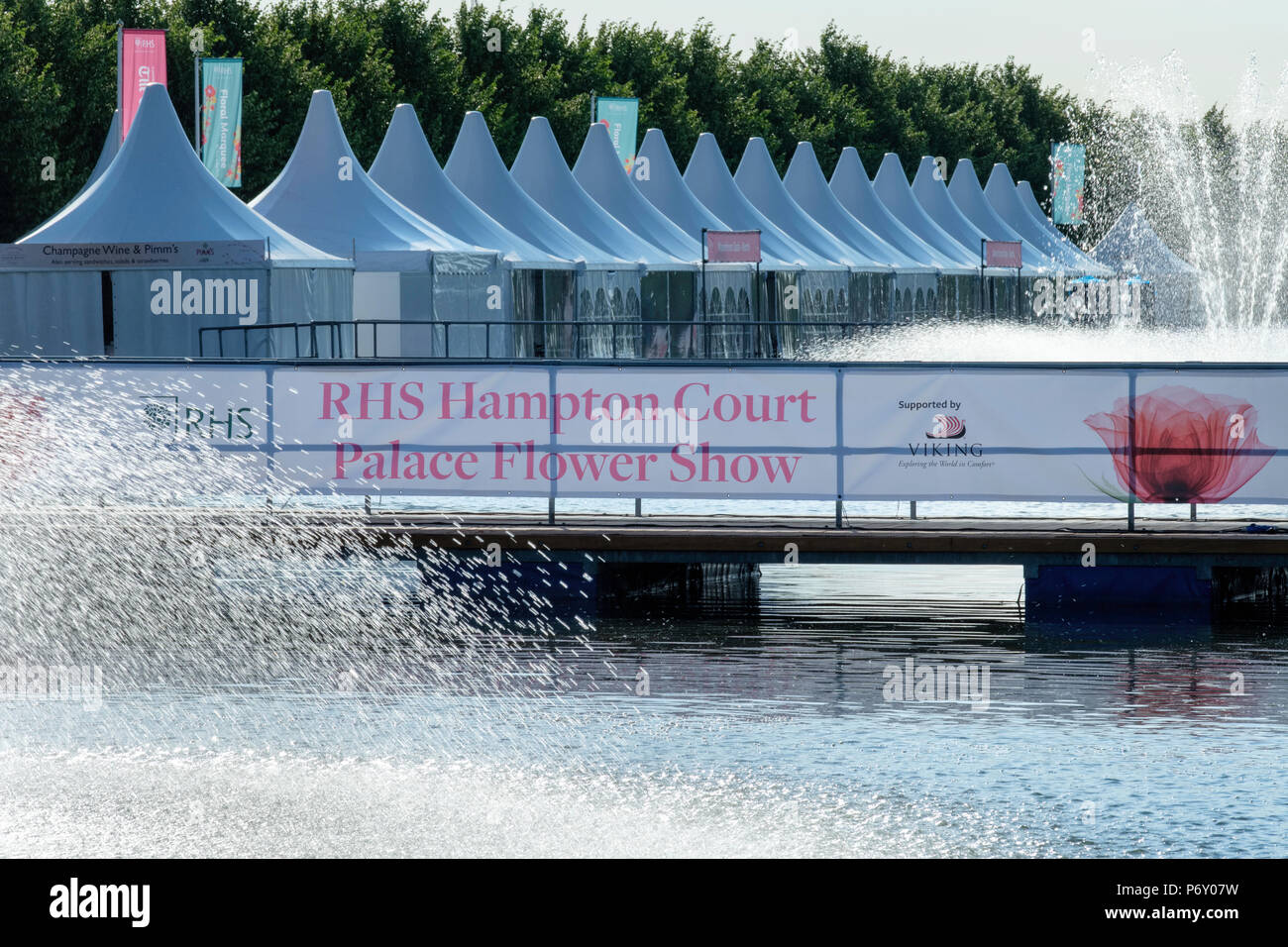 RHS Hampton Court Palace Flower Show, 2018. Banner board, bridge, fountains and hospitality tents Stock Photo