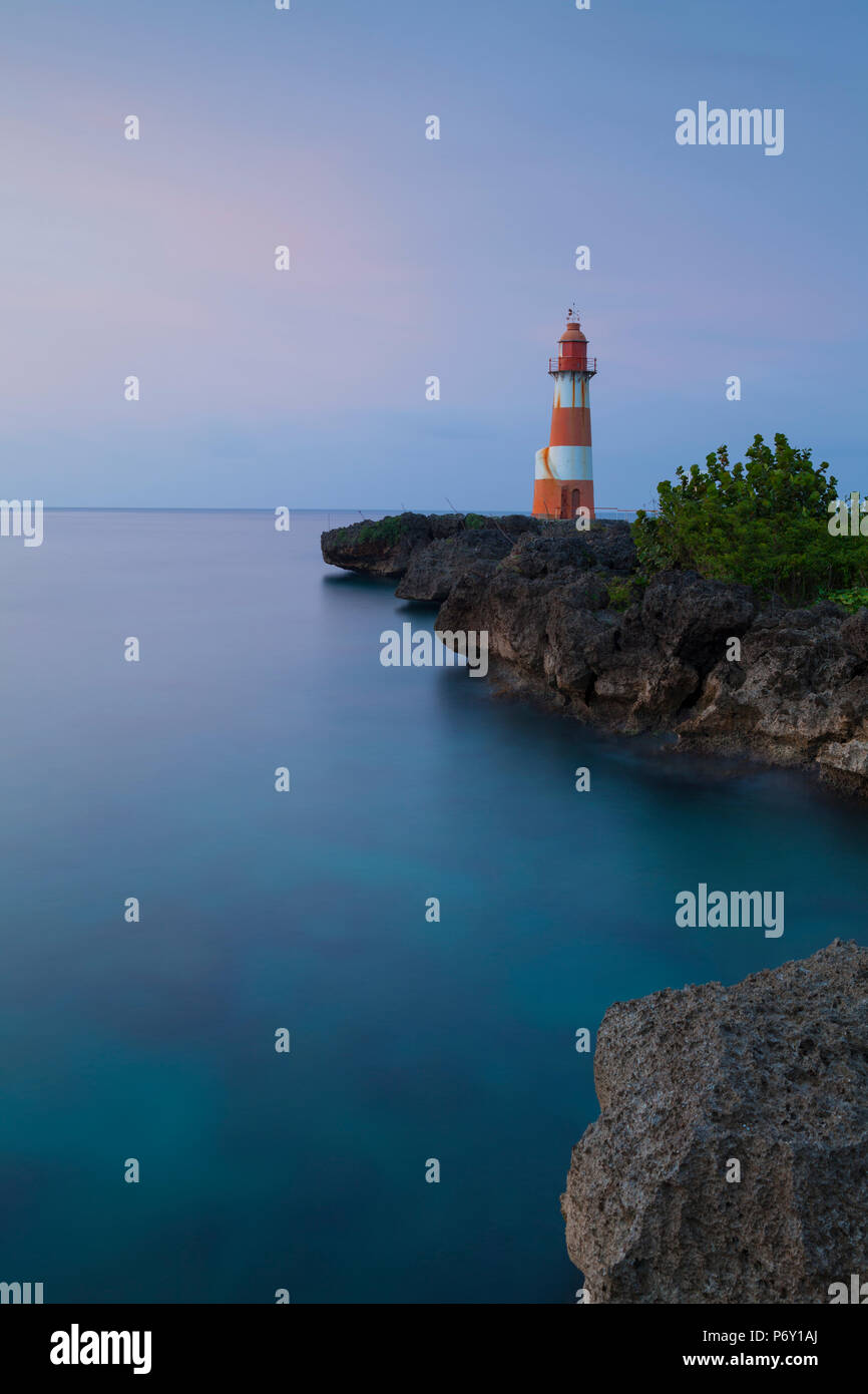 Folly Point Lighthouse illuminated at dusk, Port Antonio, Portland