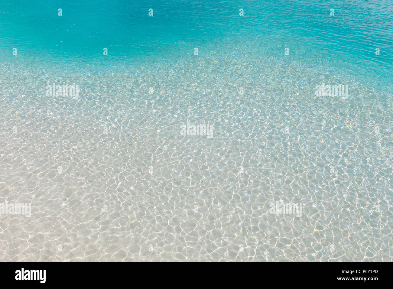 Shallow lagoon by the beach on a tropical island in the South Male Atoll, Maldives Stock Photo