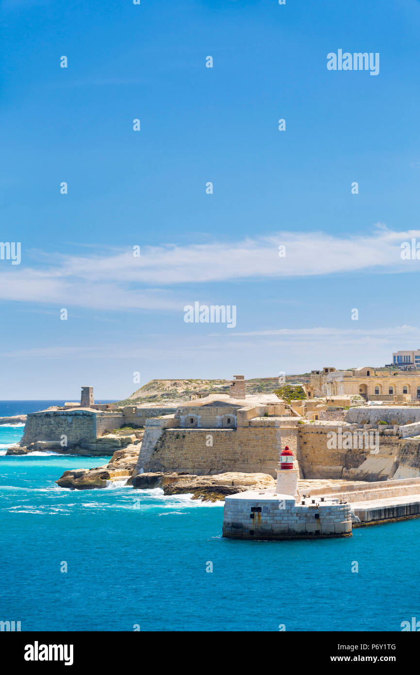 Malta, South Eastern Region, Valletta. The view across Grand Harbour to Fort Rikasoli. Stock Photo