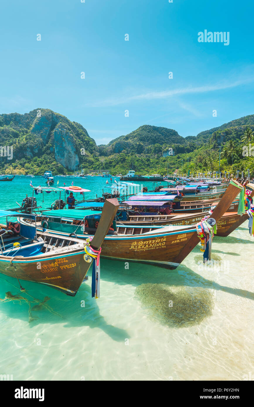 Ao Ton Sai Beach, Ko Phi Phi Don, Krabi Province, Thailand. Traditional longtail boats on the beach. Stock Photo