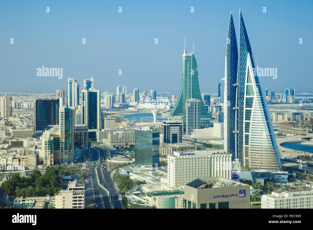 Bahrain, Manama, City center skyline looking towards Bahrain World Trade Center and Bahrain Financial Harbour Stock Photo
