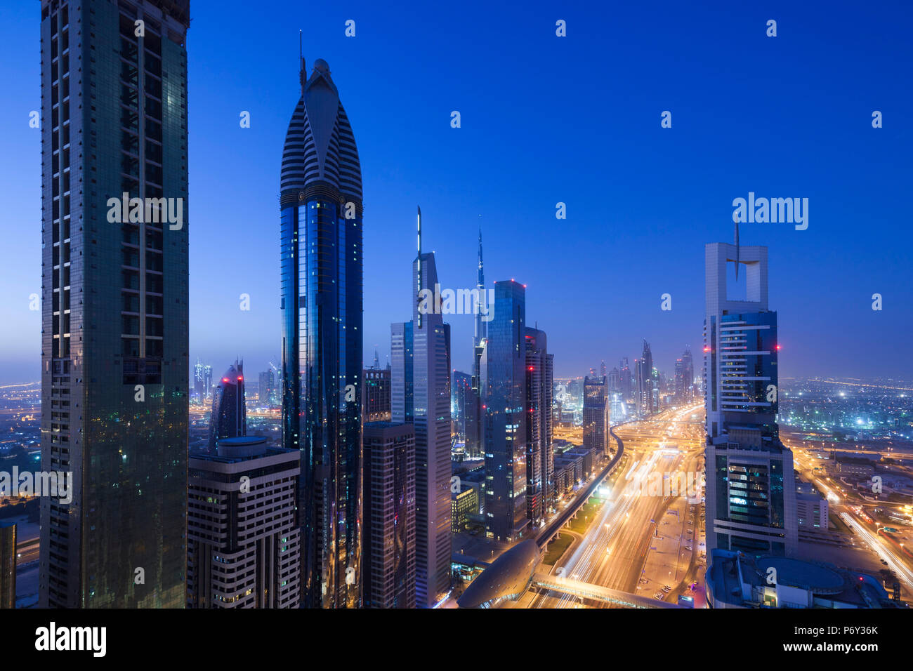 UAE, Dubai, Downtown Dubai, high rise buildings along Sheikh Zayed Road, elevated view, dawn Stock Photo