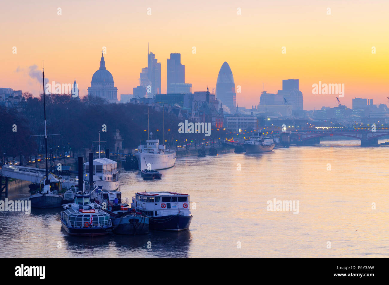 UK, England, London, City of London skyline at sunrise Stock Photo