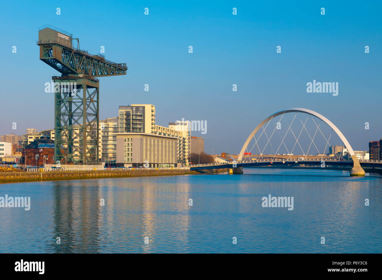 UK, Scotland, Glasgow, River Clyde, Finnieston Crane and the Clyde Arc, nicknamed the Squinty Bridge Stock Photo