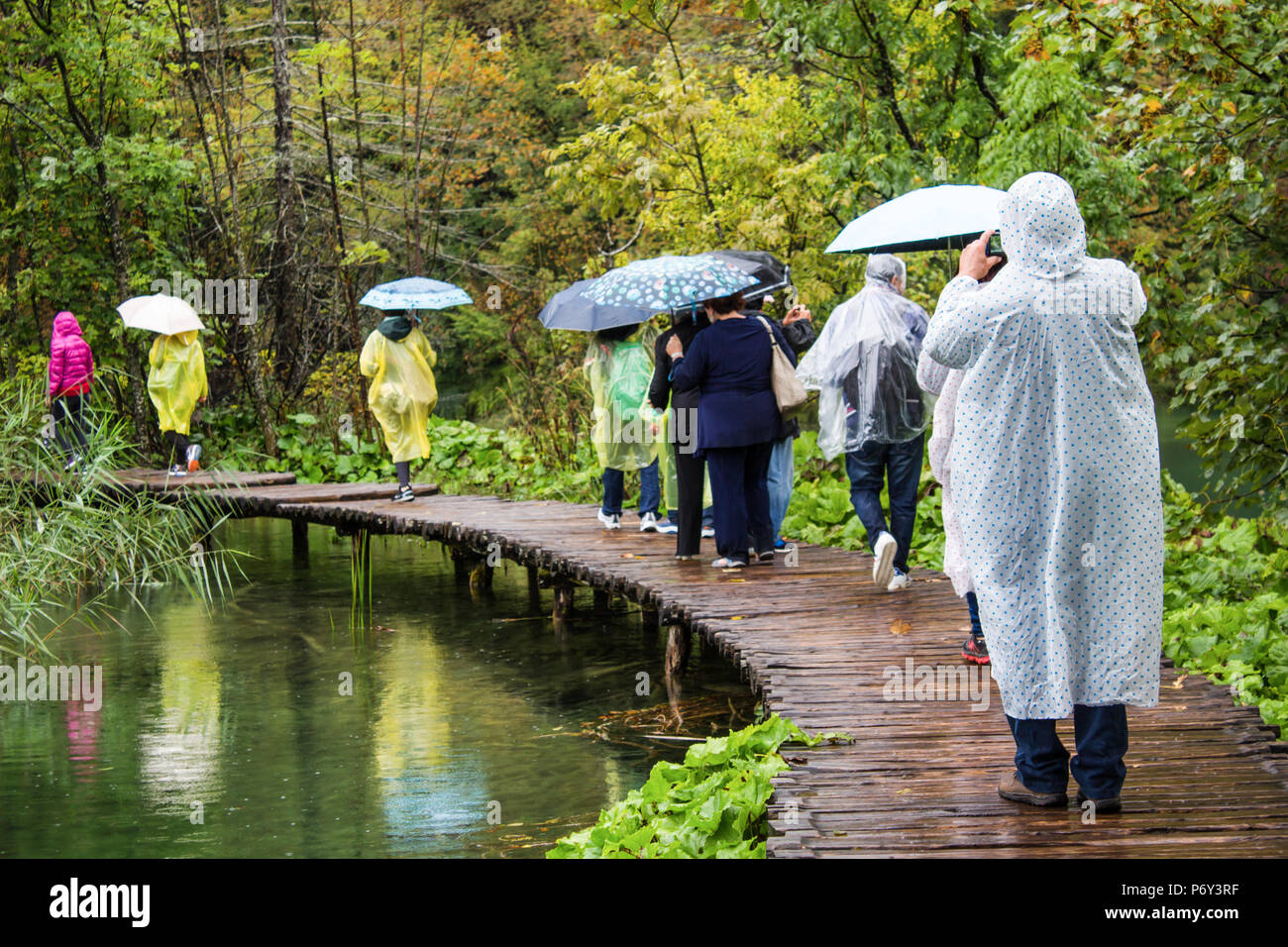 Walking raincoat shop