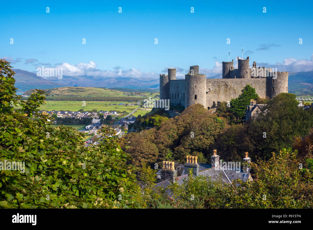 Uk, Wales, Gwynedd, Harlech, Harlech Castle, Mountains of Snowdonia National Park beyond Stock Photo