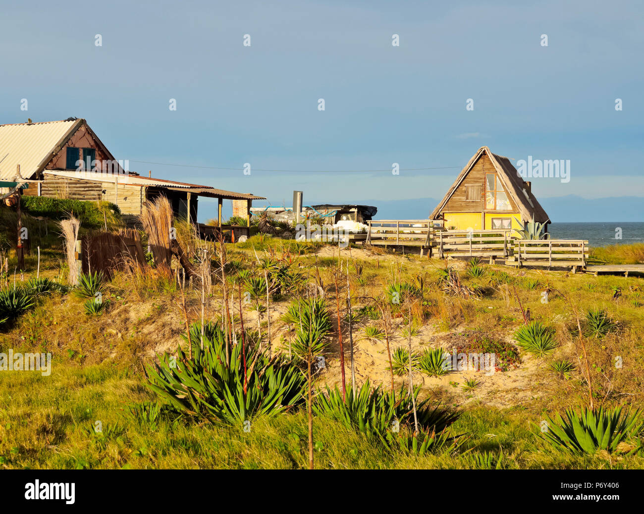 Uruguay, Rocha Department, Punta del Diablo, Houses near la Viuda Beach. Stock Photo