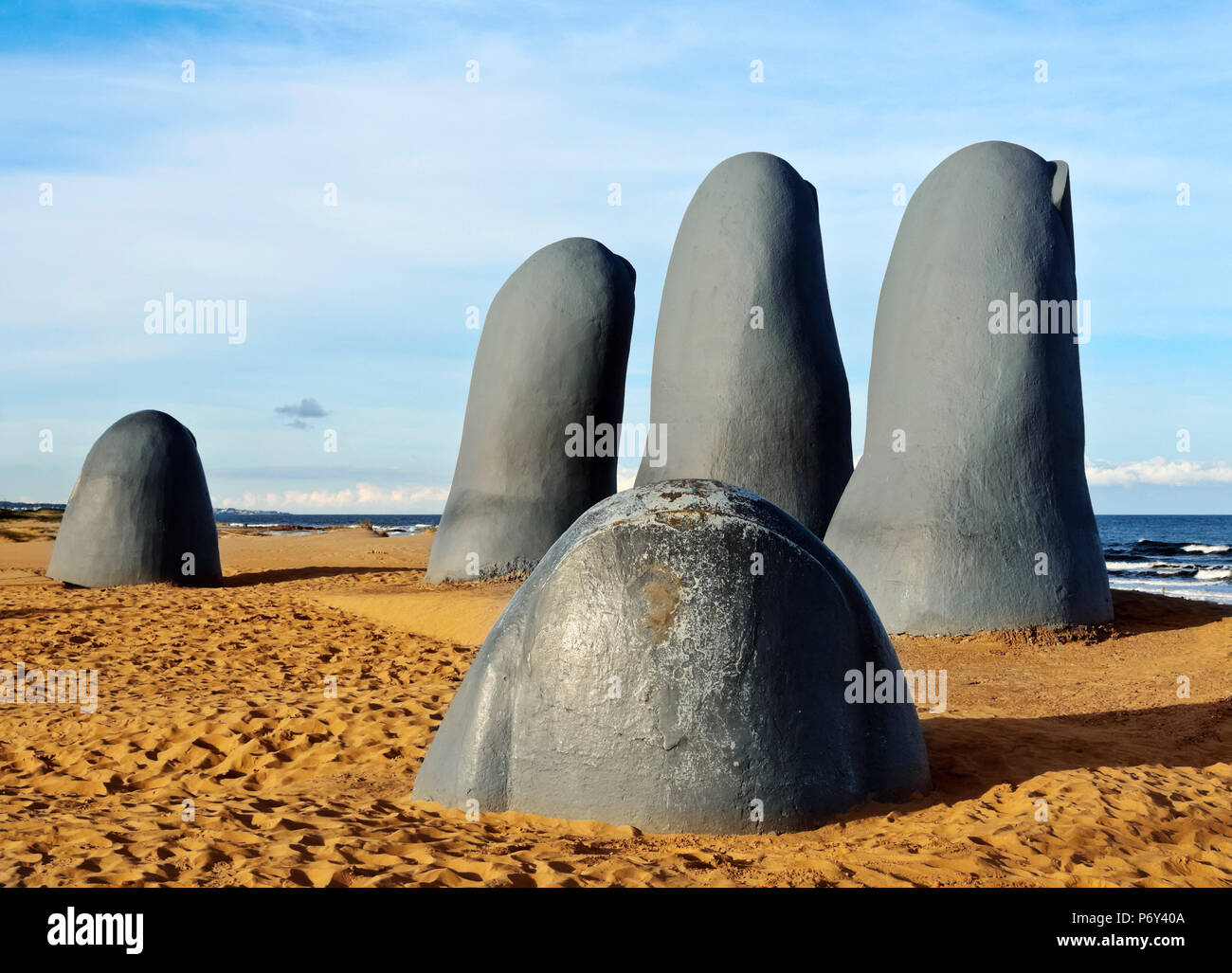 Uruguay, Maldonado Department, Punta del Este, Playa Brava, La Mano(The Hand), a sculpture by Chilean artist Mario Irarrazabal. Stock Photo