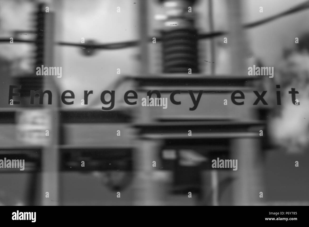 Emergency exit sign Black and White Stock Photos & Images Alamy