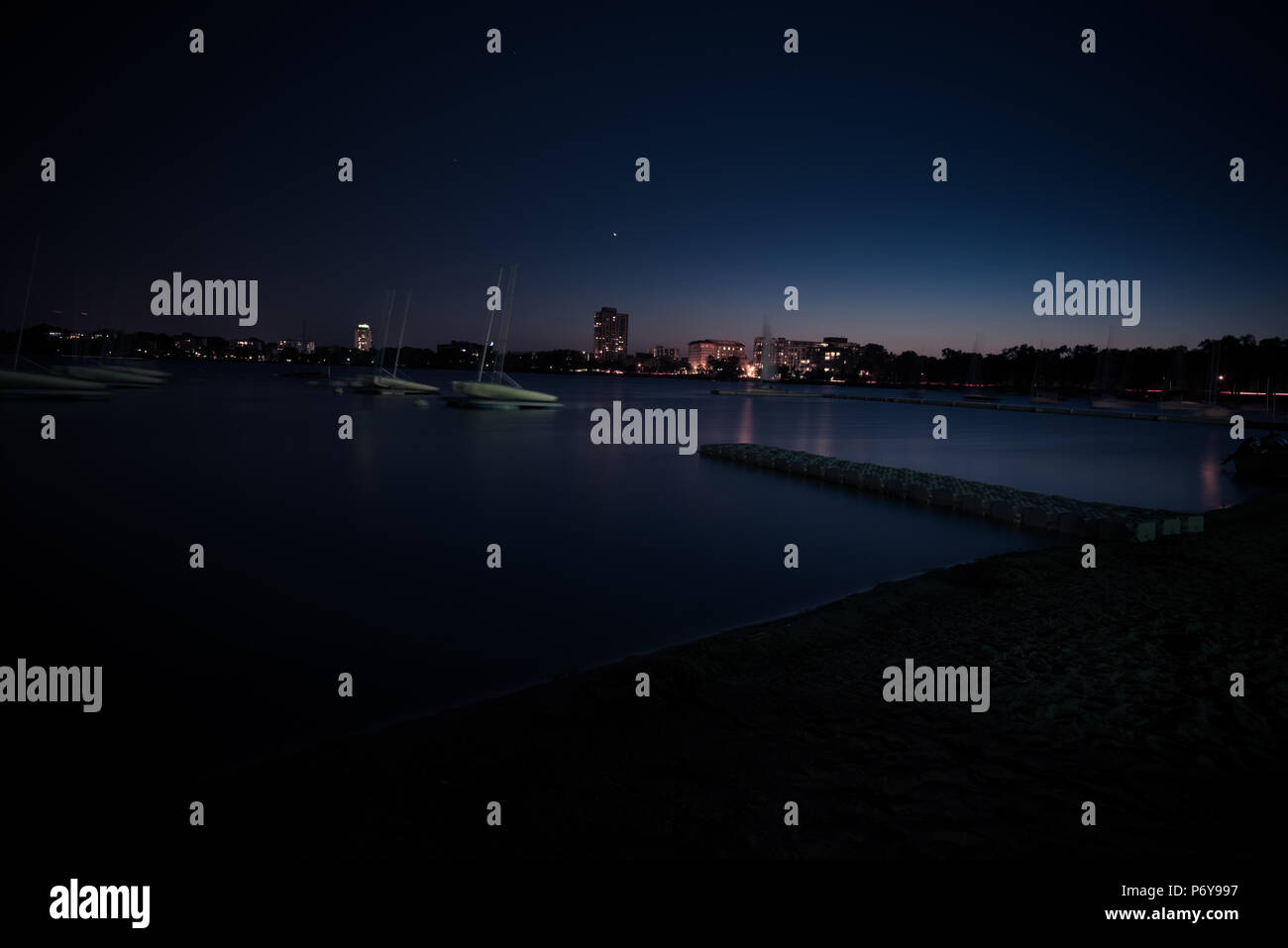 Urban lake just after sunset on a summer night. Stock Photo