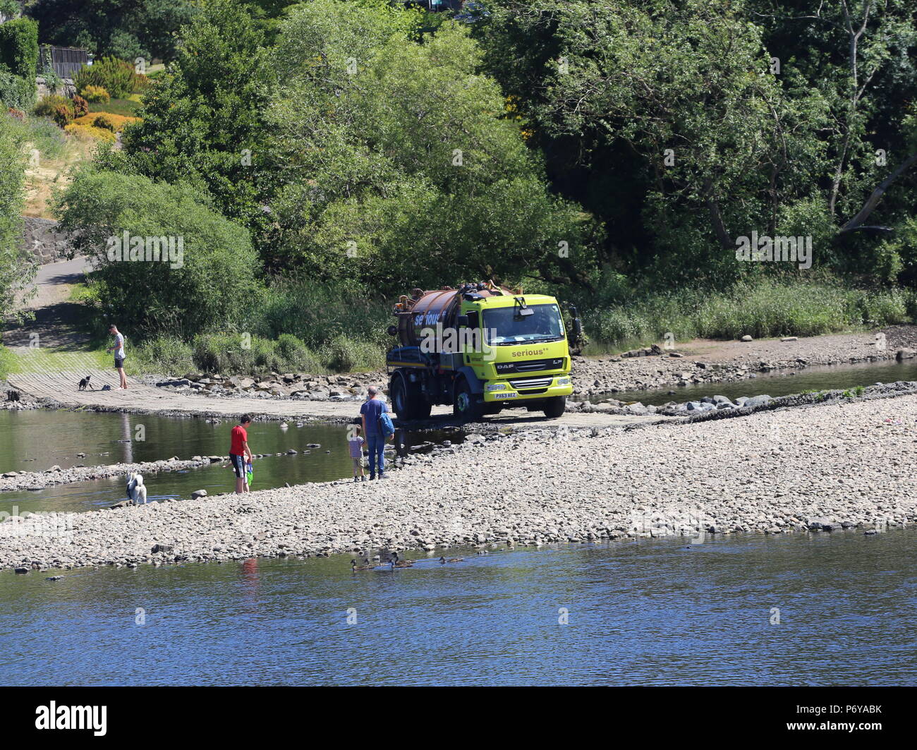 Vehicles crossing causeway across River Tay to Friarton Island Perth ...