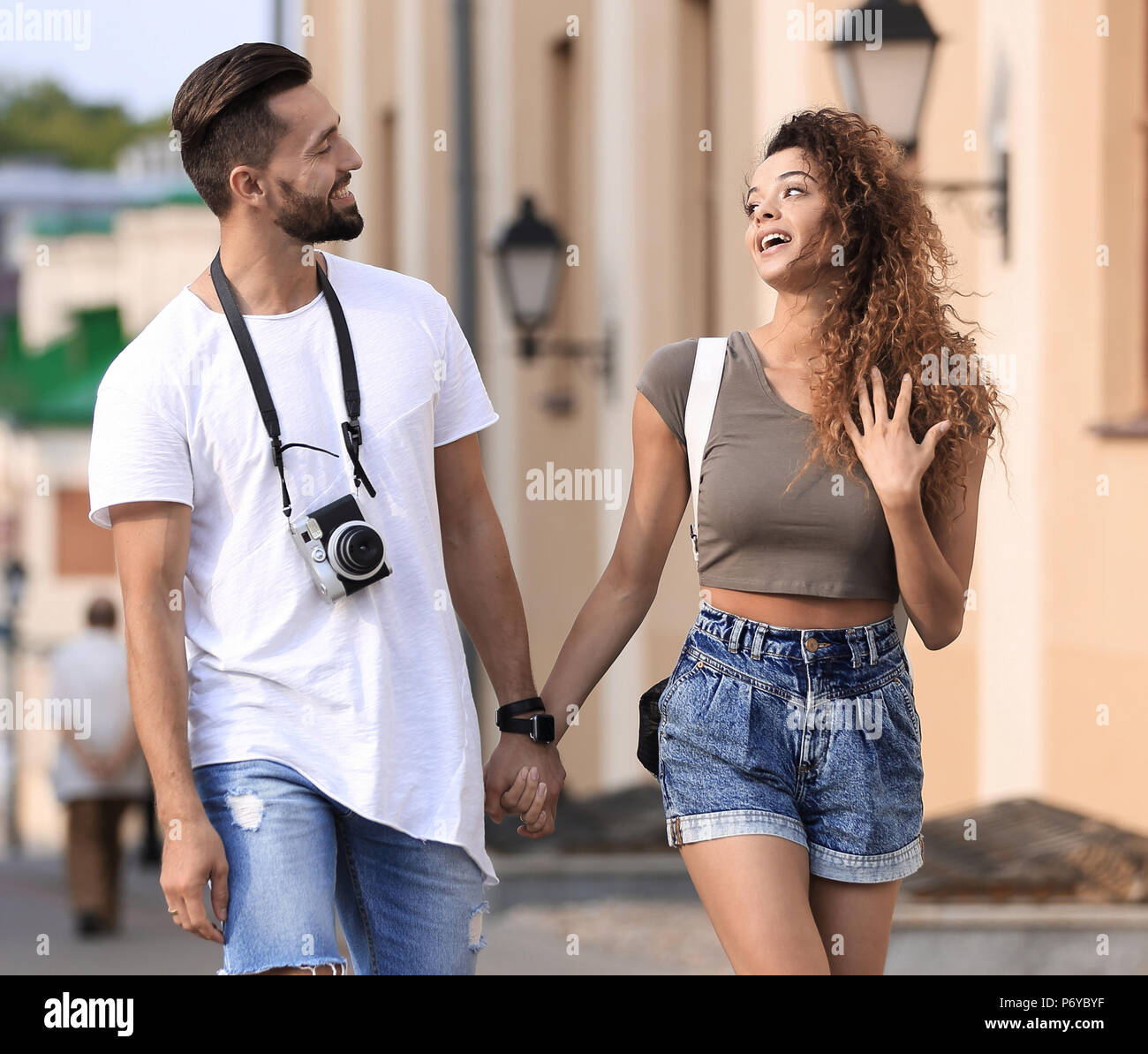 Male friends walking watching hi-res stock photography and images - Alamy