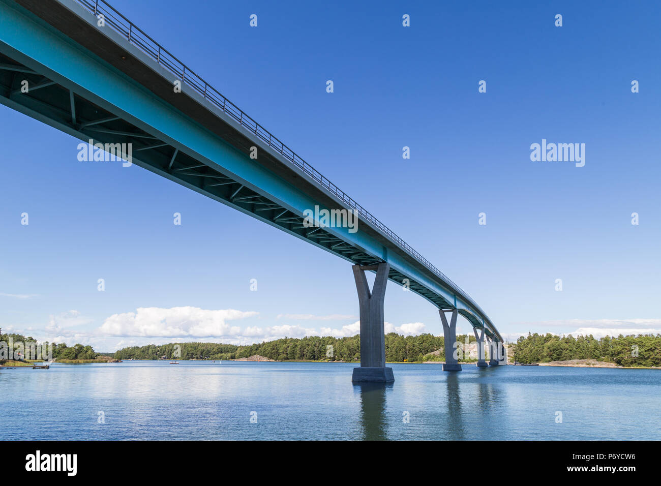 Long Lövö bridge and blue sky and seacape shot underneath in Kemiönsaari, Kasnäs, Finland Stock Photo