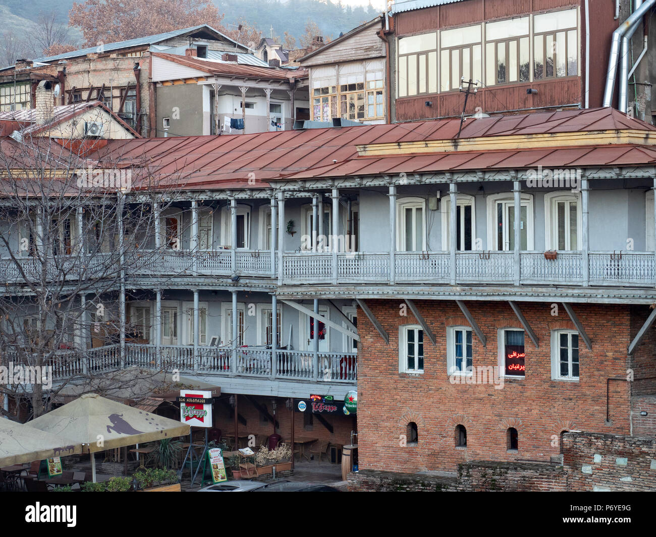 Tbilisi, Georgia - November 28, 2016 : traditional houses with wooden and wrought iron balconies, one of the city’s best known historical features. Ma Stock Photo