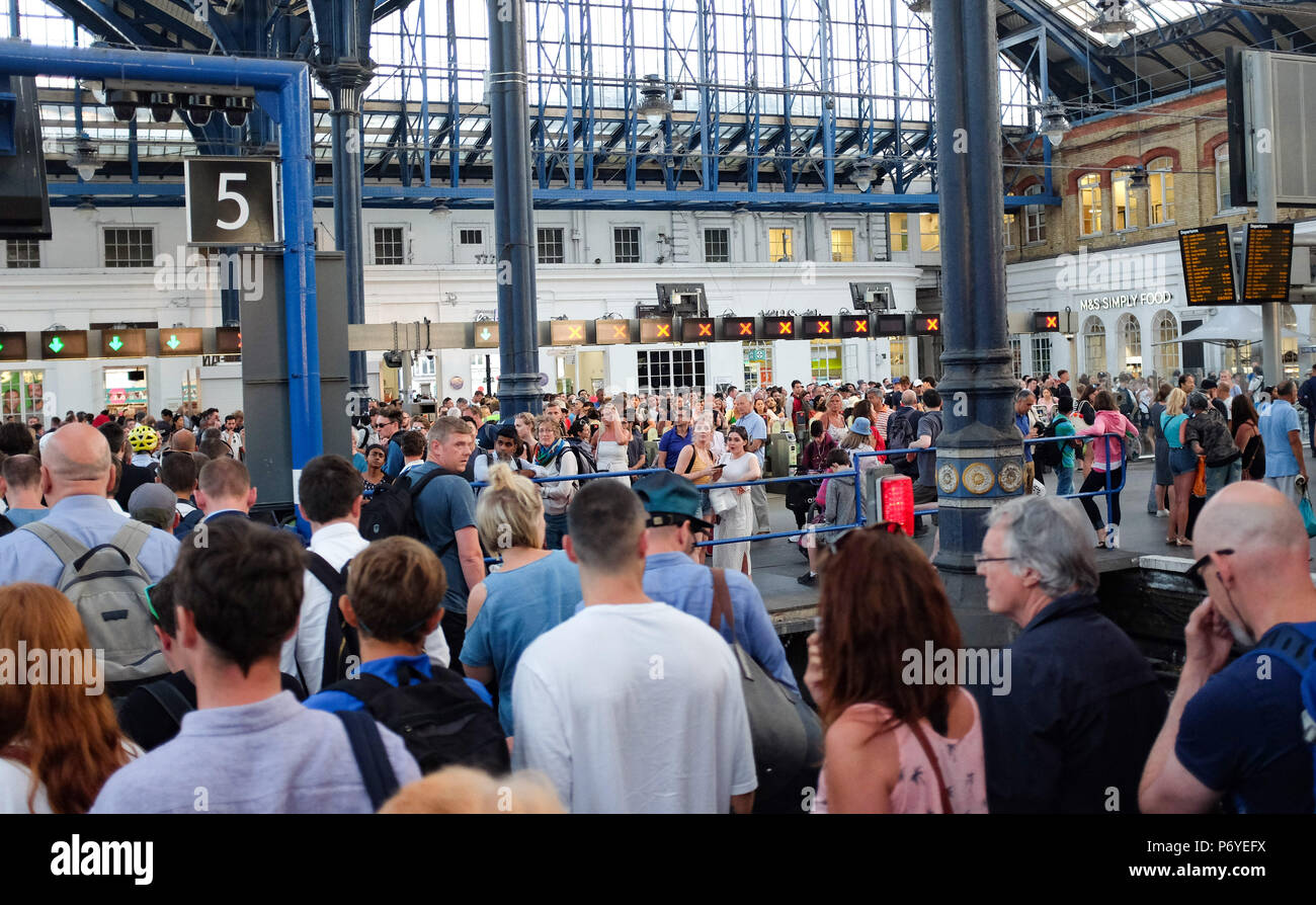 Brighton UK 2nd July 2018 - Passengers arrive back into Brighton Station after long delays on  a Gatwick Express train caused by signal problems from London Victoria Stock Photo