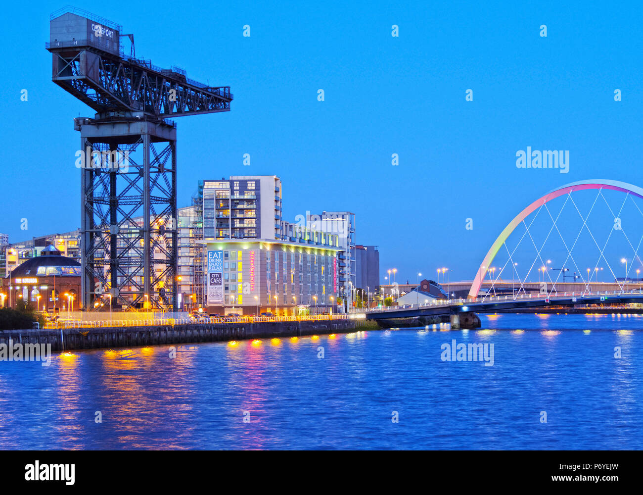 UK, Scotland, Lowlands, Glasgow, Twilight view of the Finnieston Crane and the Clyde Arc. Stock Photo