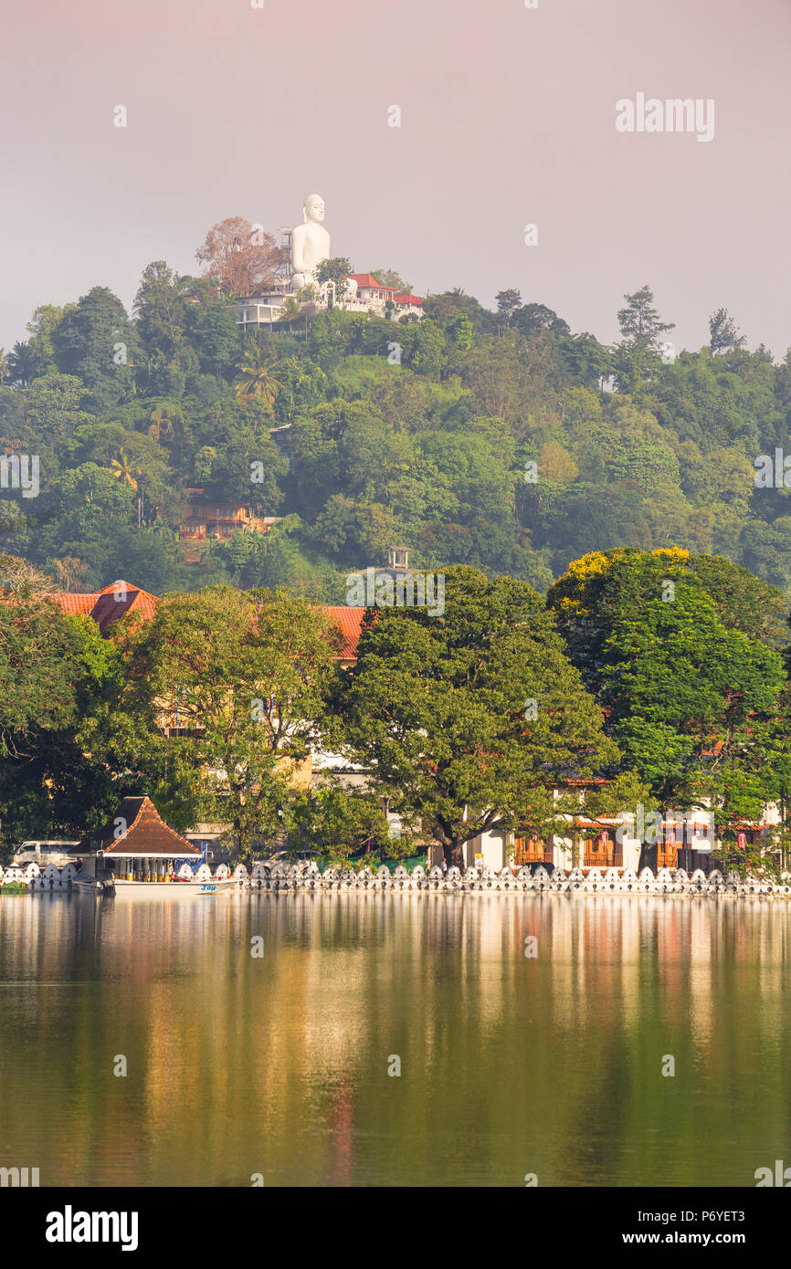 Sri Lanka, Kandy,  Bahiravokanda Vihara Buddha Statue above Kandy Lake and the Temple of the Tooth Stock Photo