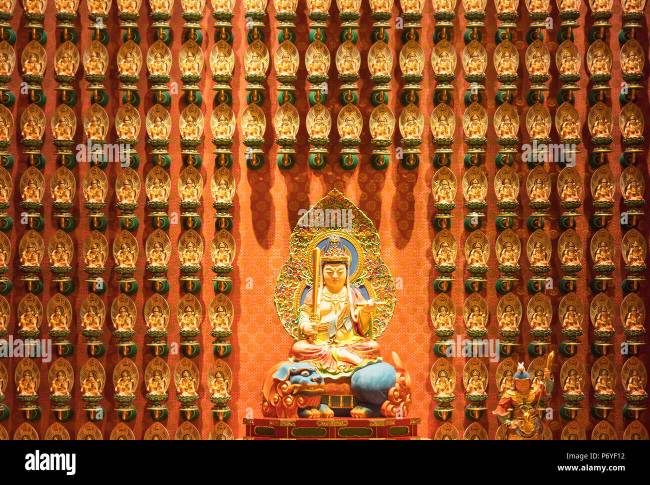 Buddha statues in Buddha Tooth Relic Temple, Chinatown, Singapore Stock