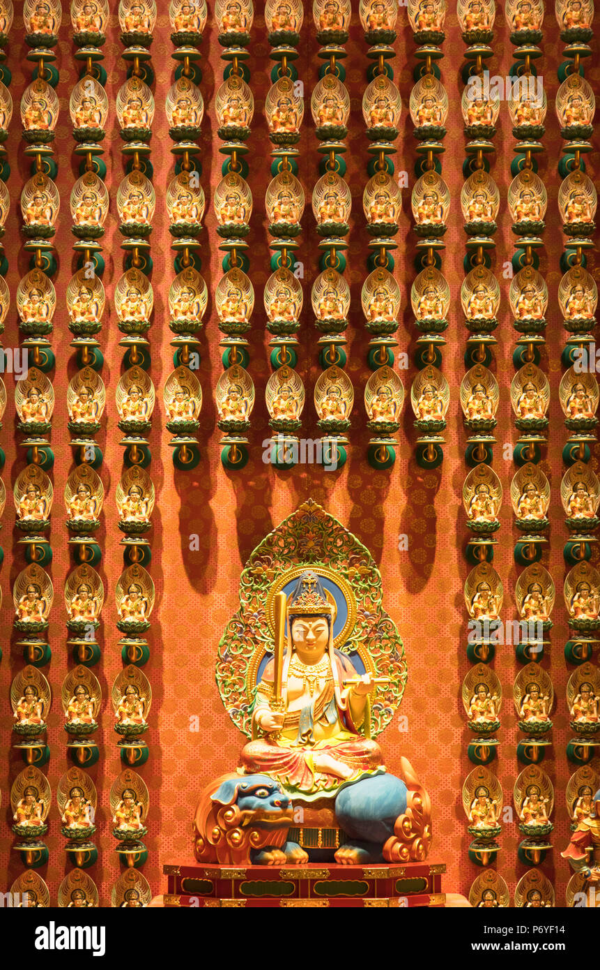 Buddha statues in Buddha Tooth Relic Temple, Chinatown, Singapore Stock