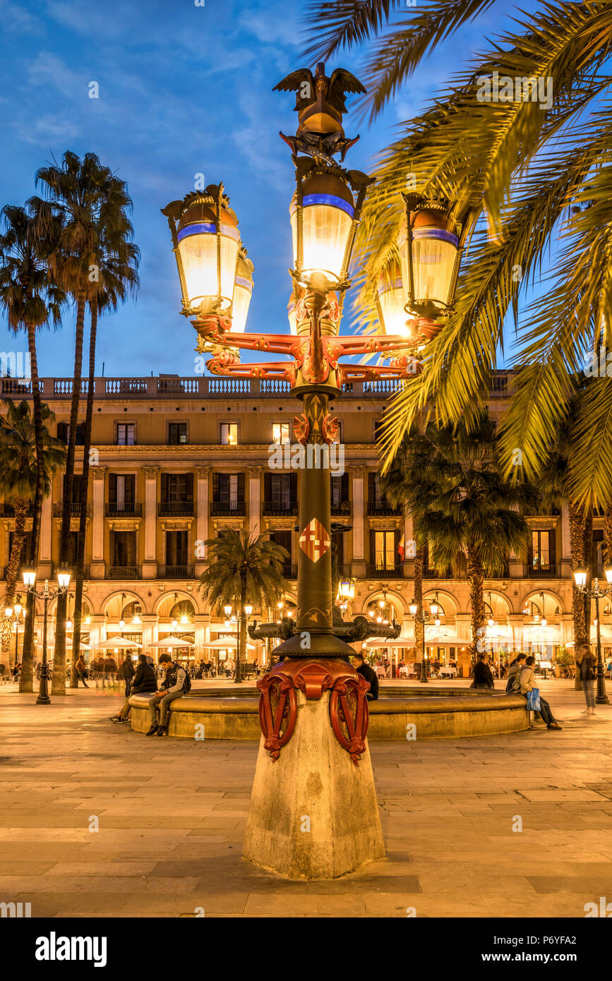 Lamp post designed by the famous Catalan architect Antoni Gaudi in Placa Reial square (Plaza Real), Gothic Quarter, Barcelona, Catalonia, Spain Stock Photo