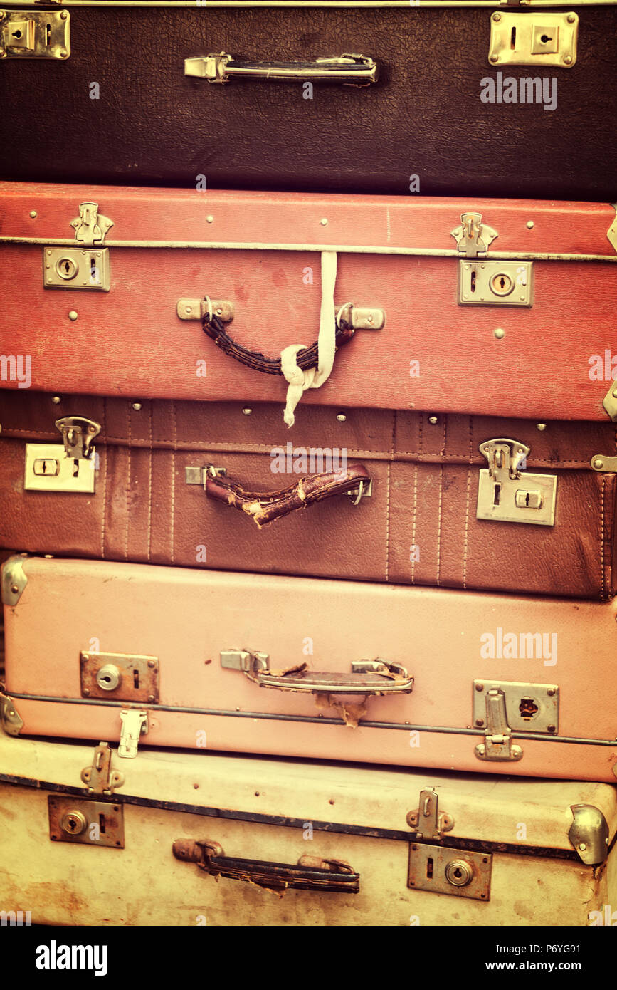 Stack of old vintage suitcases, vintage process Stock Photo