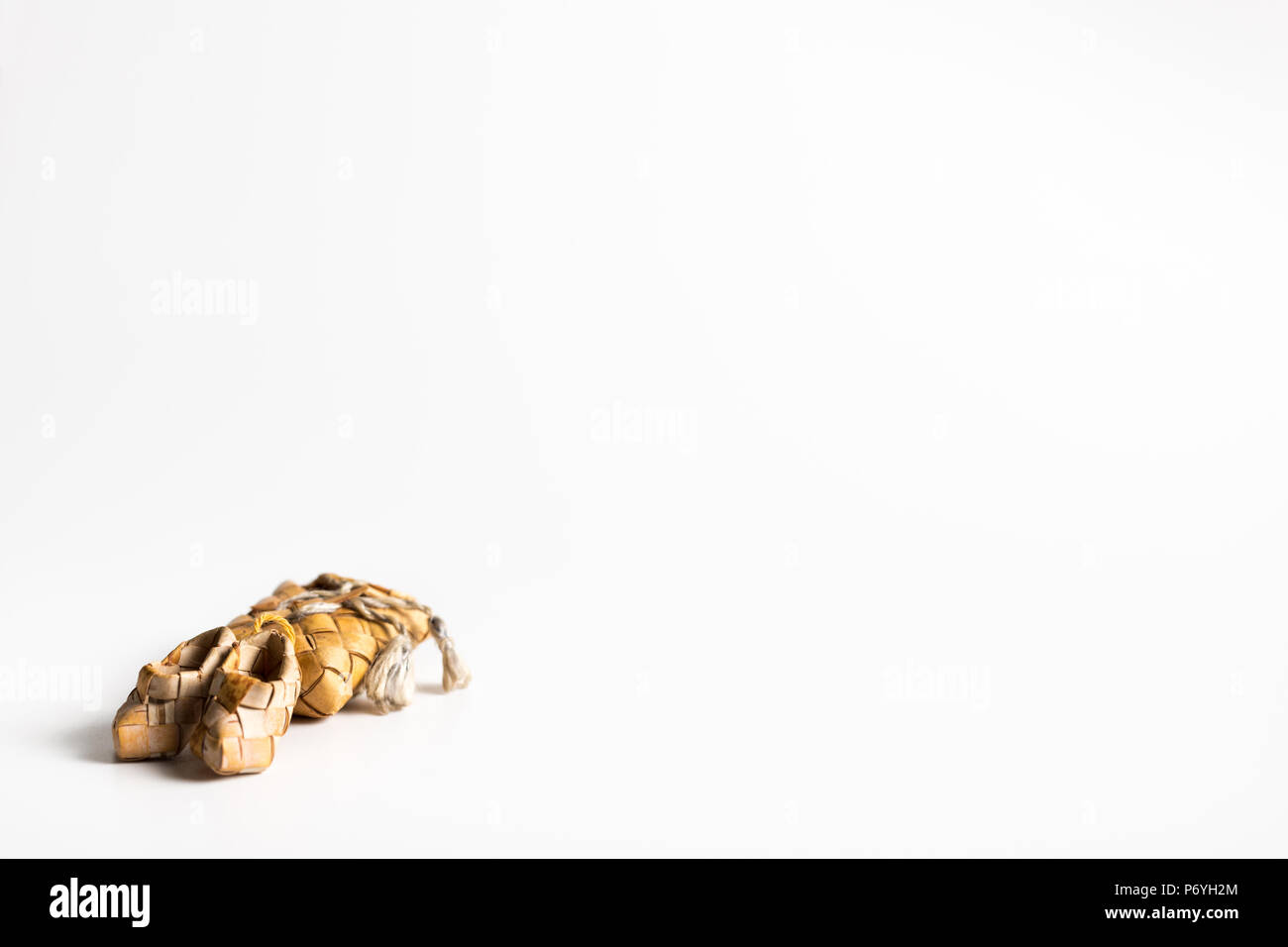 Handmade miniature sized pair of Finnish traditional shoes and knapsack