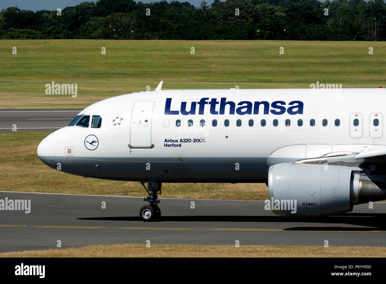 Lufthansa Airbus A320-200 taxiing for take off at Birmingham Airport, UK (D-AIZJ) Stock Photo